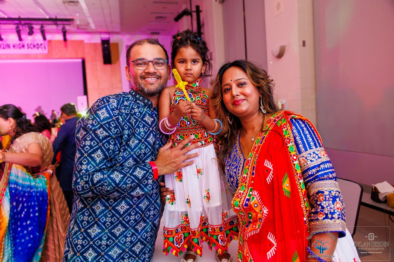 A family in festive outfits at Bollywood Garba Brooklin